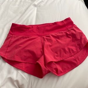 Pink Lululemon shorts hardly used size 2
